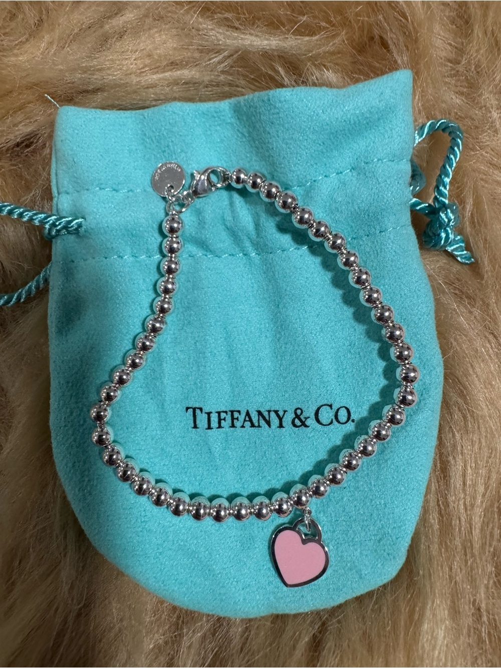 Tiffany & Co. Silver Bead Bracelet with Pink Heart Charm in Brand New Condition